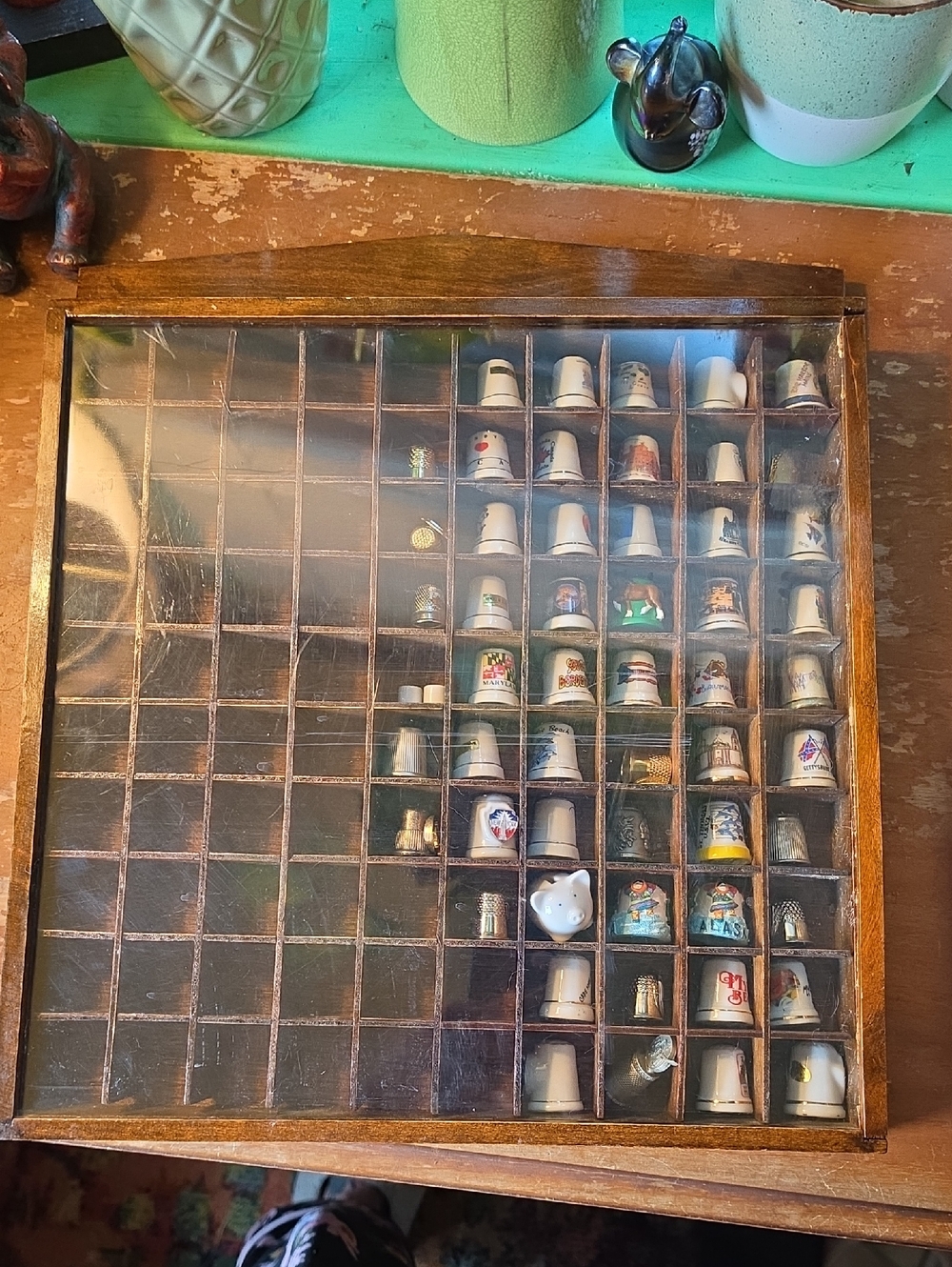 Wooden Display Case with Glass Top Filled with Decorative Thimbles - Brown